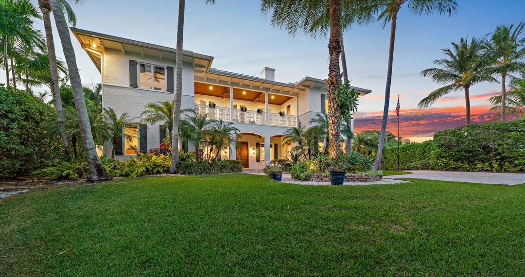 Experience year round ocean breezes in this British West Indies inspired 4 BR, 4.