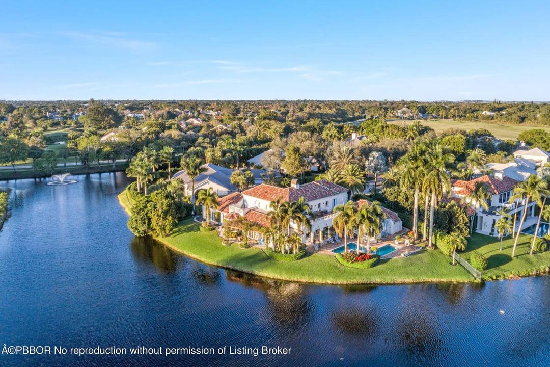 It is rare to find a home on the private enclave of Fairway Island in Palm Beach Polo amp ; Country Club available let alone one this outstanding.
