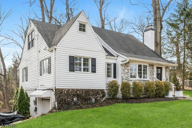 HONEY STOP THE CAR ! This well maintained custom Cape Cod, lake style home could be your new all year retreat.