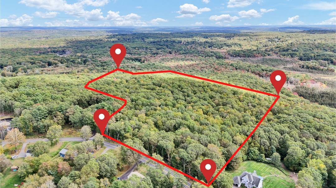 Discover your own slice of nature with this expansive 52 acre parcel in Tolland, offering endless opportunities for outdoor enjoyment.