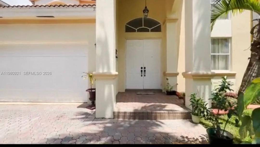 Step into luxury and comfort in the highly coveted, 24 7 guard gated community of Melrose Cove in West Miramar.