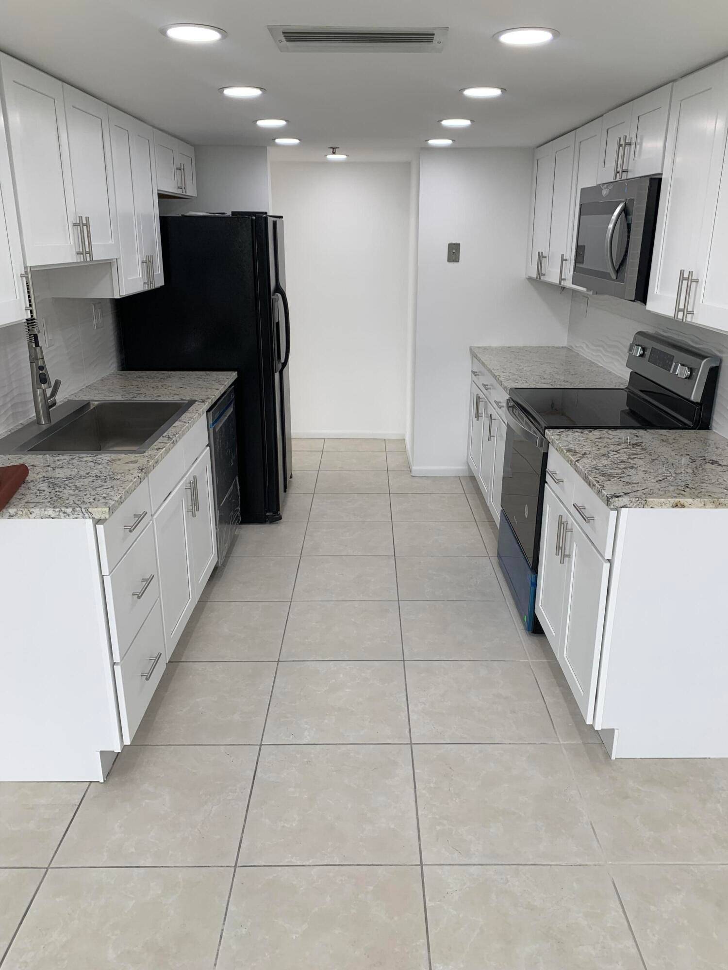 THIS IS THE ONE ! Pristine remodeled condo.