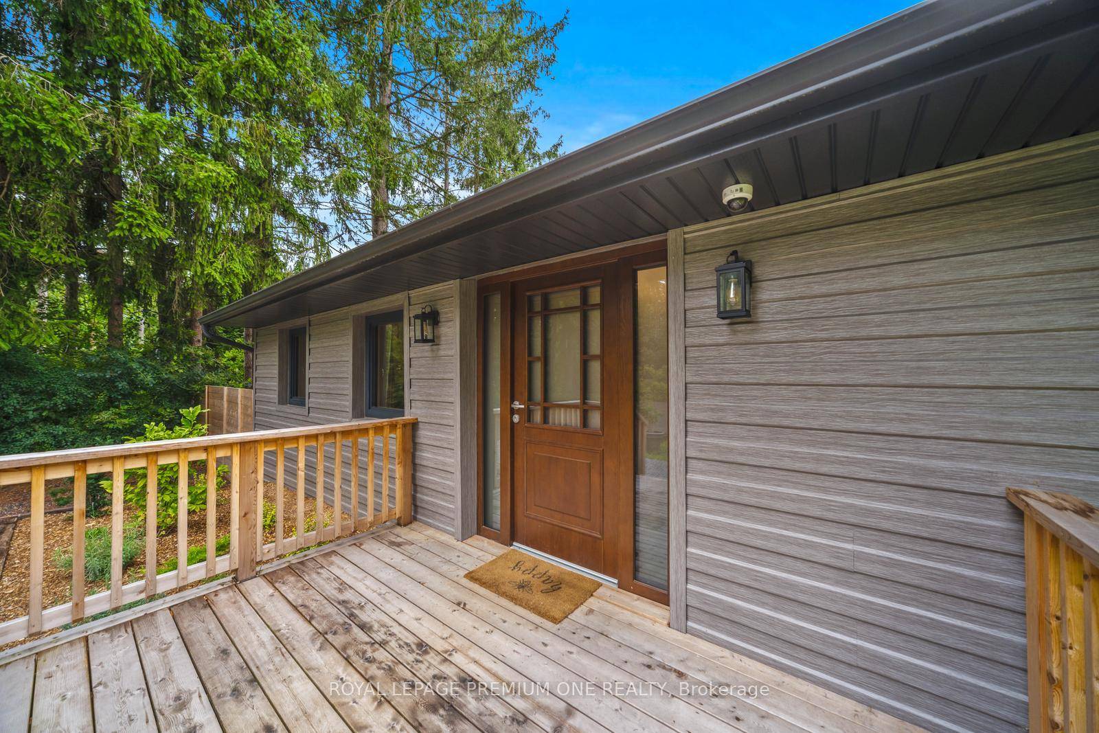 Charming bungalow extensively renovated from top to bottom in quiet rural Stouffville setting.