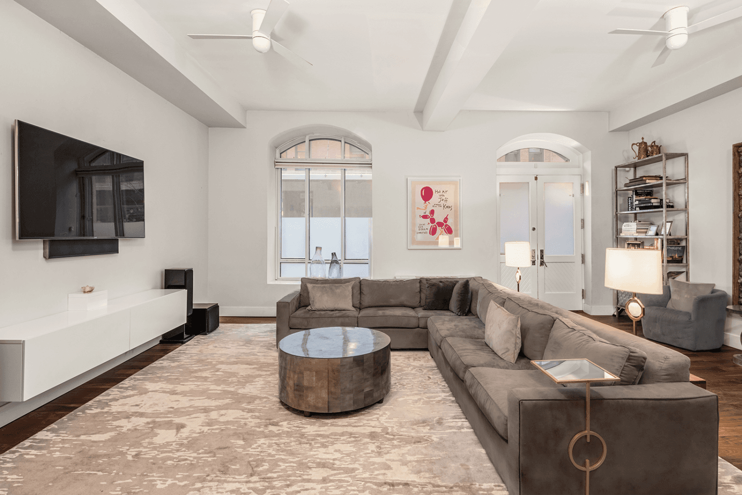 In TriBeCa's historic Sugar Warehouse, this one of a kind 2, 000 square foot Maisonette condominium perfectly fuses modern design with classic pre war charm.