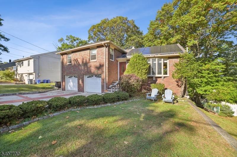 Welcome to 63 Hemlock, a beautifully maintained all brick split level home, located in a quiet, non through neighborhood in the heart of this desirable train town.