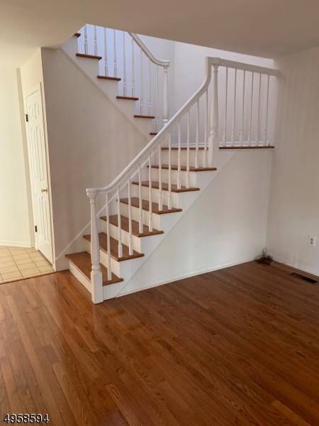 Very nice townhouse ! This is an impeccable Carlisle Model with hard wood floors.