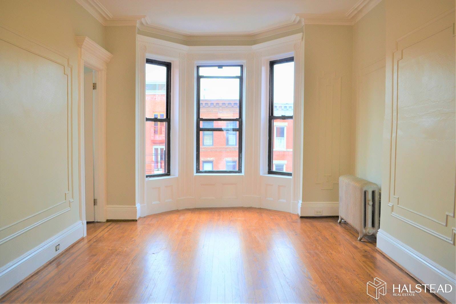 Bright top floor two bedroom in a three unit townhouse on lush treed block in Prime North Slope.