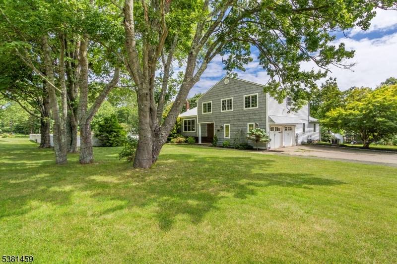 Welcome to this fully renovated four bedroom, two and a half bath home offering modern updates, versatile living spaces, and a private outdoor retreat.