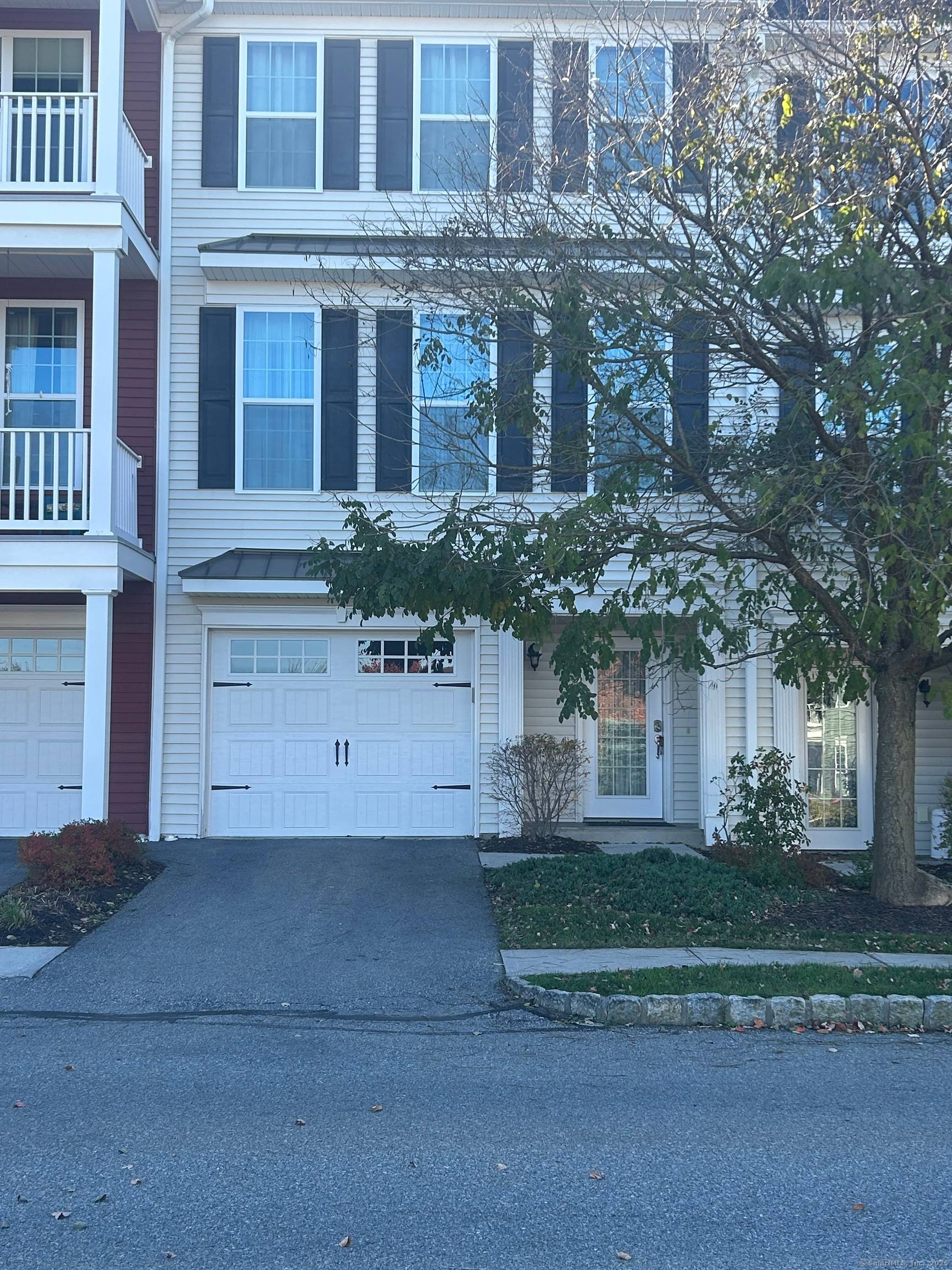 Light and bright townhouse with many architectural upgrades.