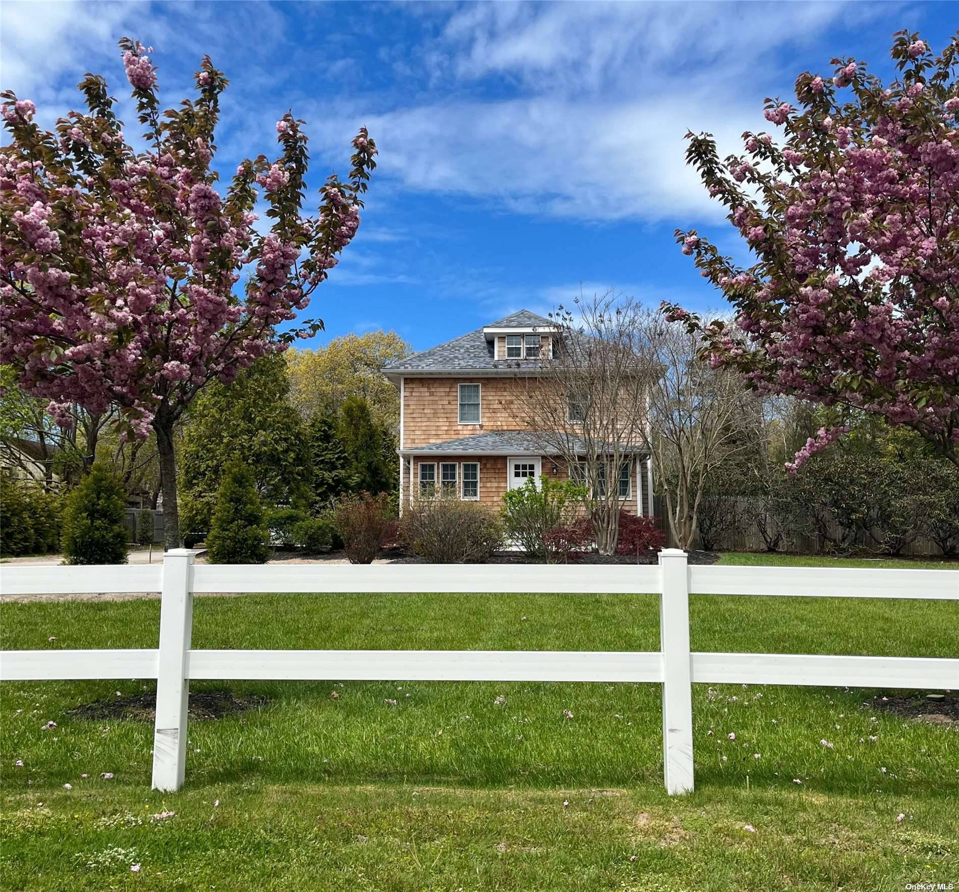 This quintessential Hampton House on one acre of beautifully manicured gardens with inground resort style pool is just an 8 minutes drive to Ponquogue Beach on Dune Road.