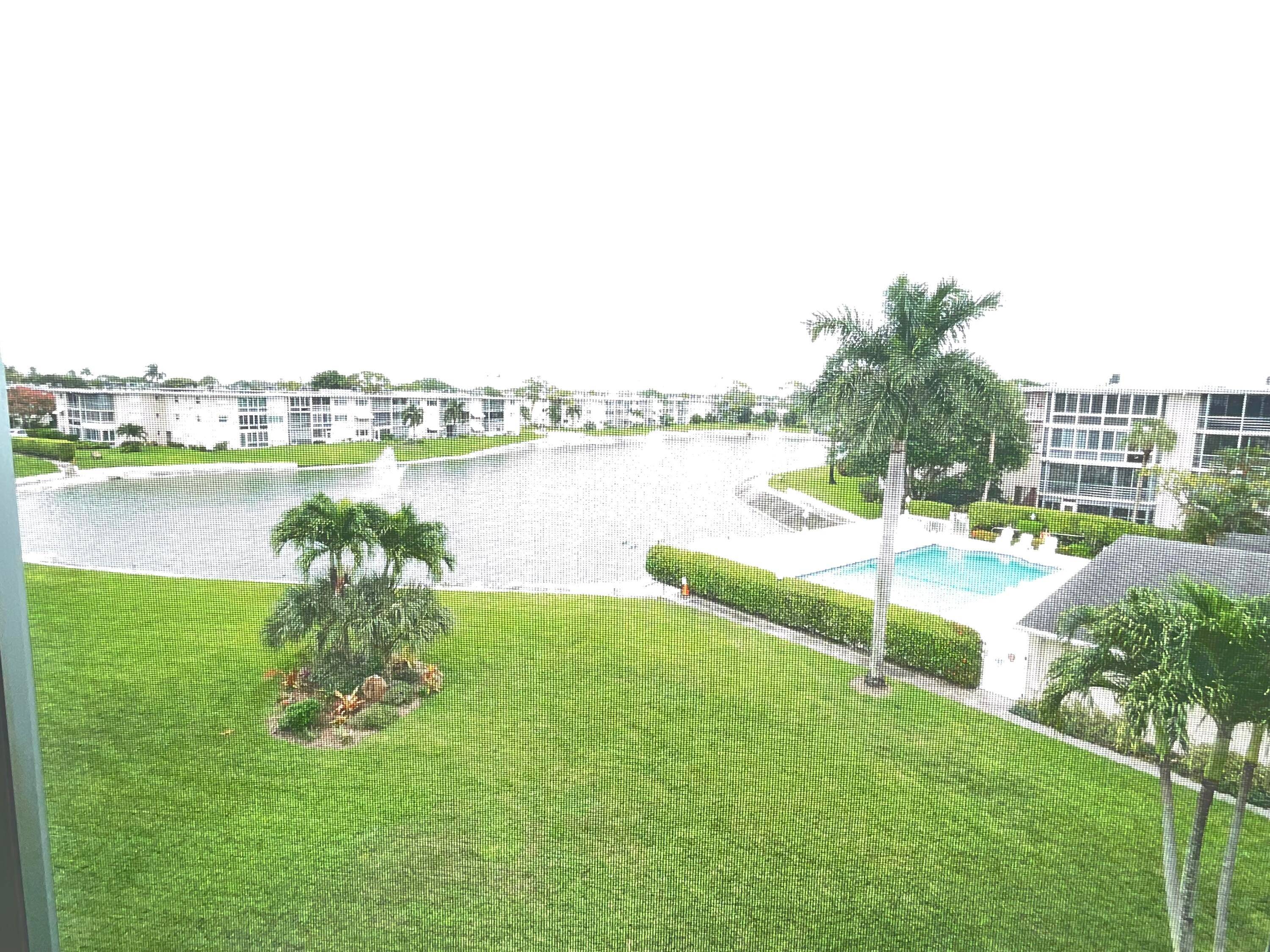 Welcome to Stunning serene lake and pool view from the private balcony Condo.