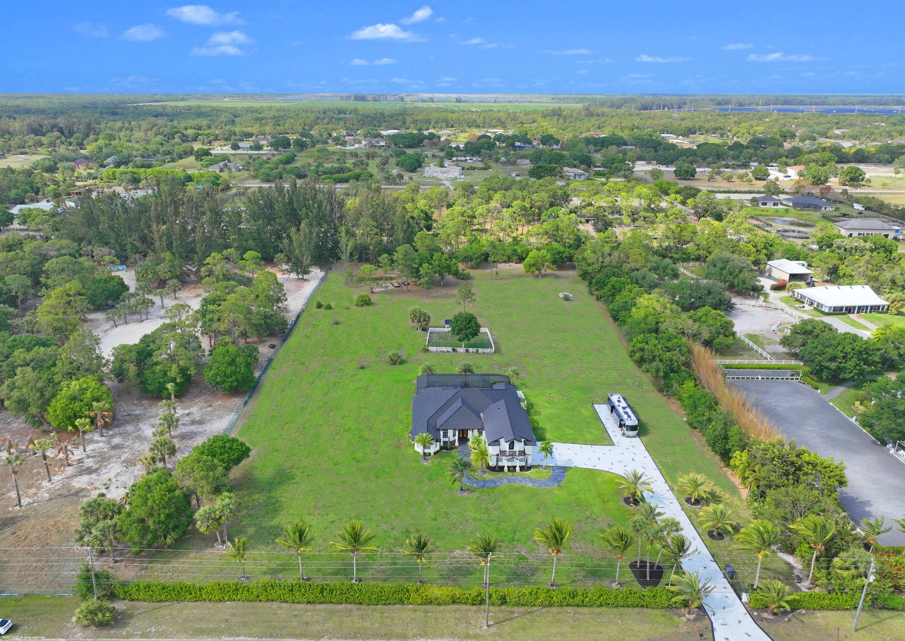 Beautifully remodeled 5Br home on 5 cleared acres, perfect for the active family or equestrians !