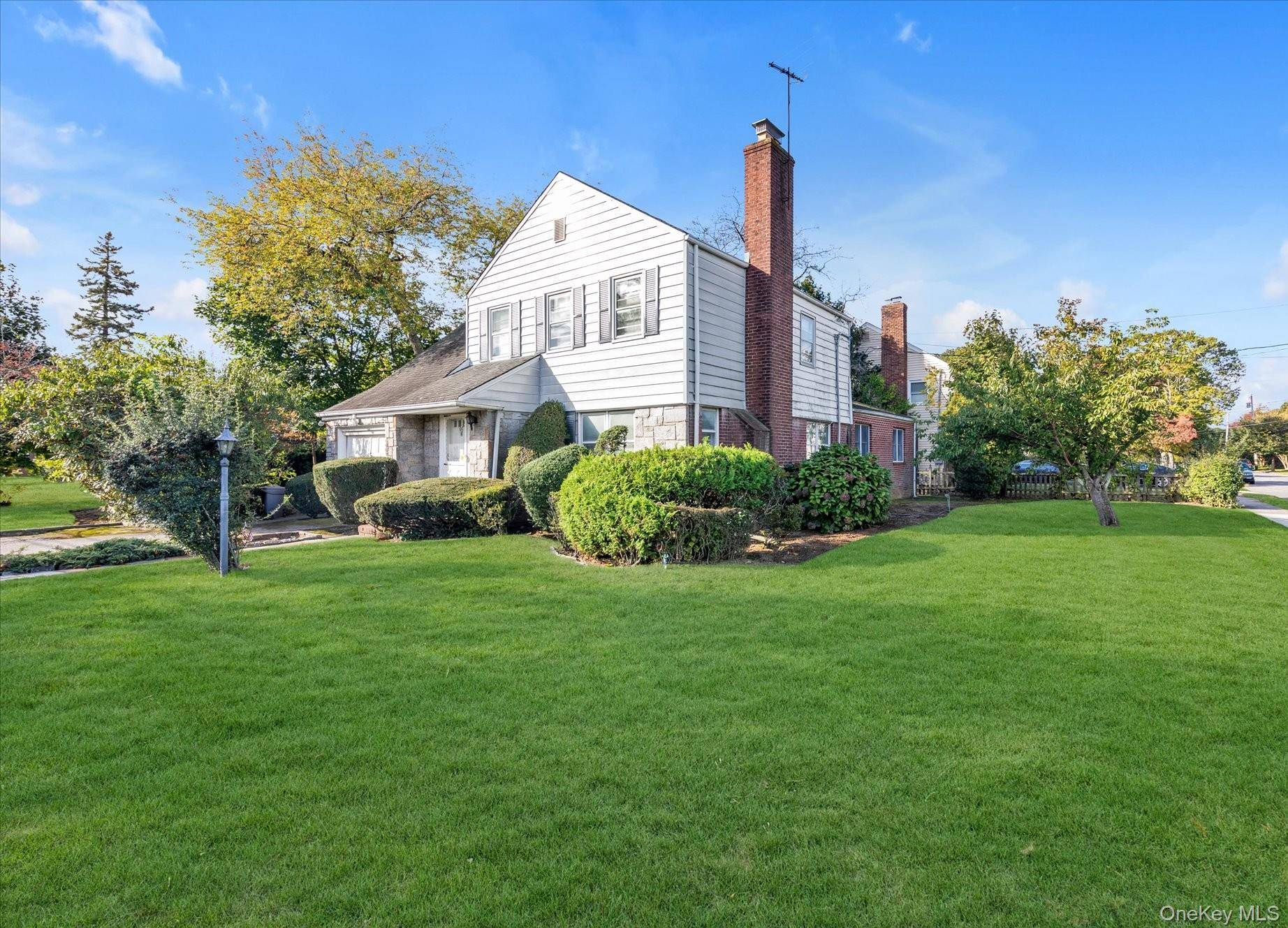 Charming Colonial located in the heart of Malverne on a tremendous lot of over 10, 000 square feet.