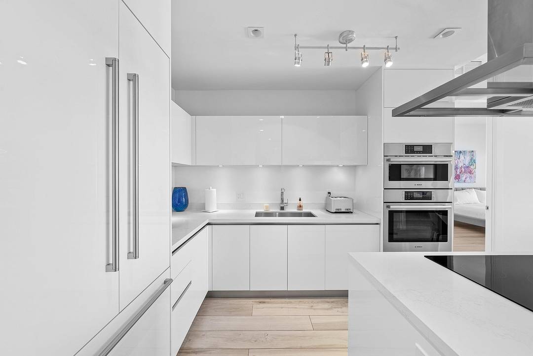 Beautiful 2 bedroom, 2 bath residence at Tower 155 with stunning city and ocean views from a large private balcony overlooking Mizner Park.