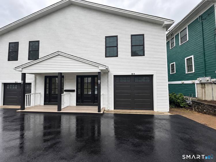 Experience modern living in this nearly new duplex in desirable Milford.