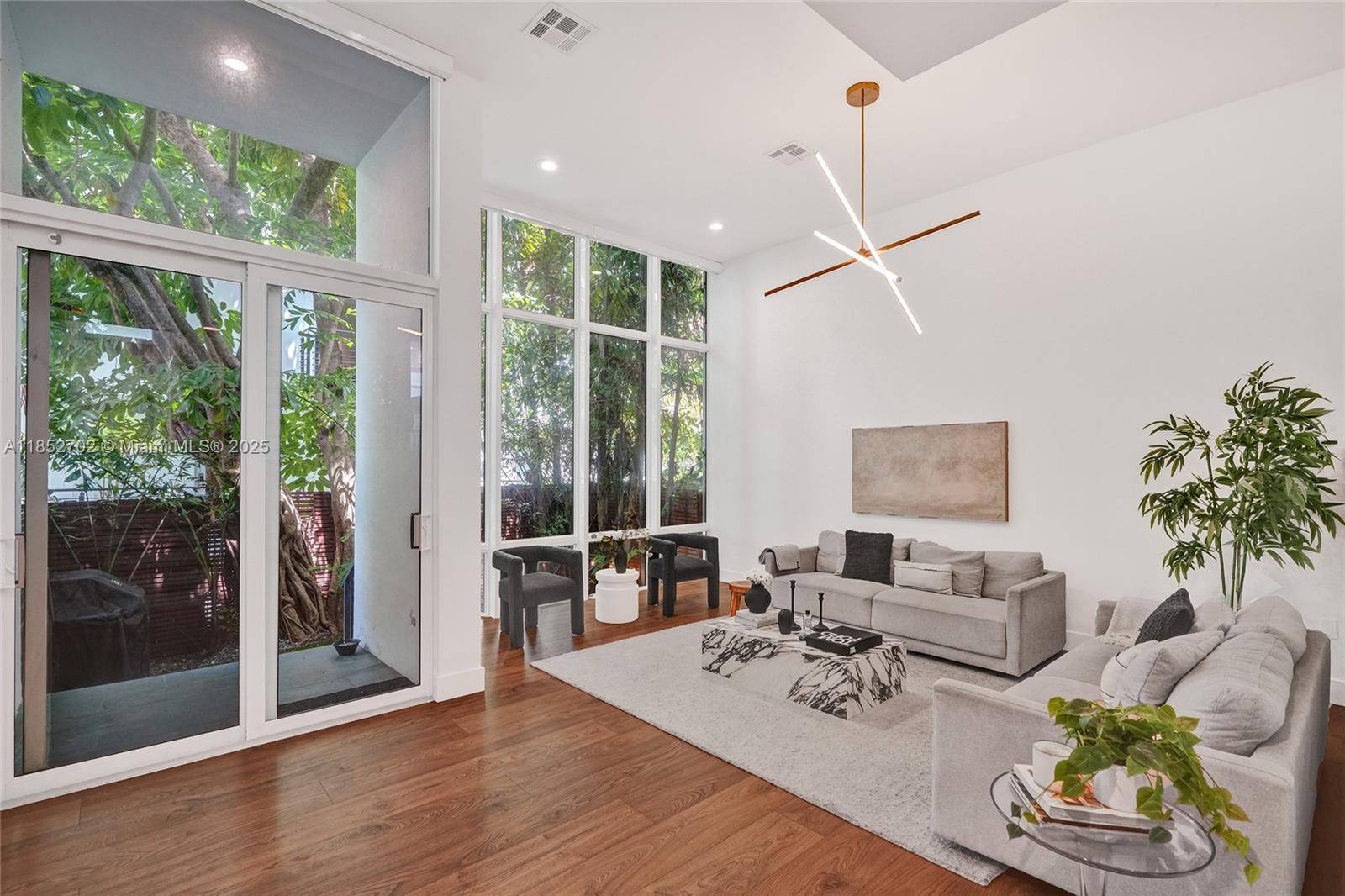 Beautifully updated tri level townhouse in The Habitat, an exclusive 5 unit boutique community tucked away on a quiet, gated cul de sac.