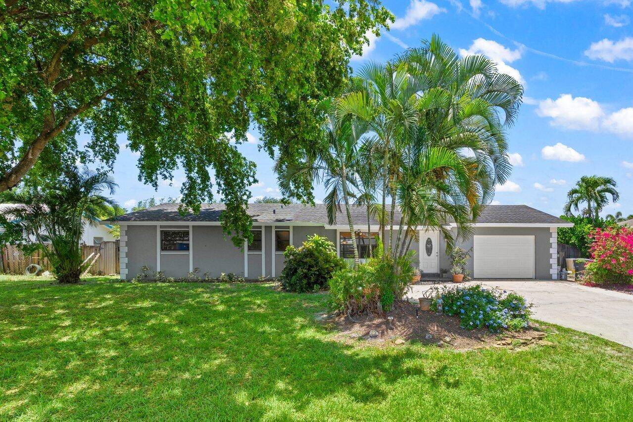 Welcome home to this spacious 4 bedroom, 2 bath residence located in a quiet, no HOA neighborhood just minutes from downtown Delray, and one of Florida's most beautiful coastlines.