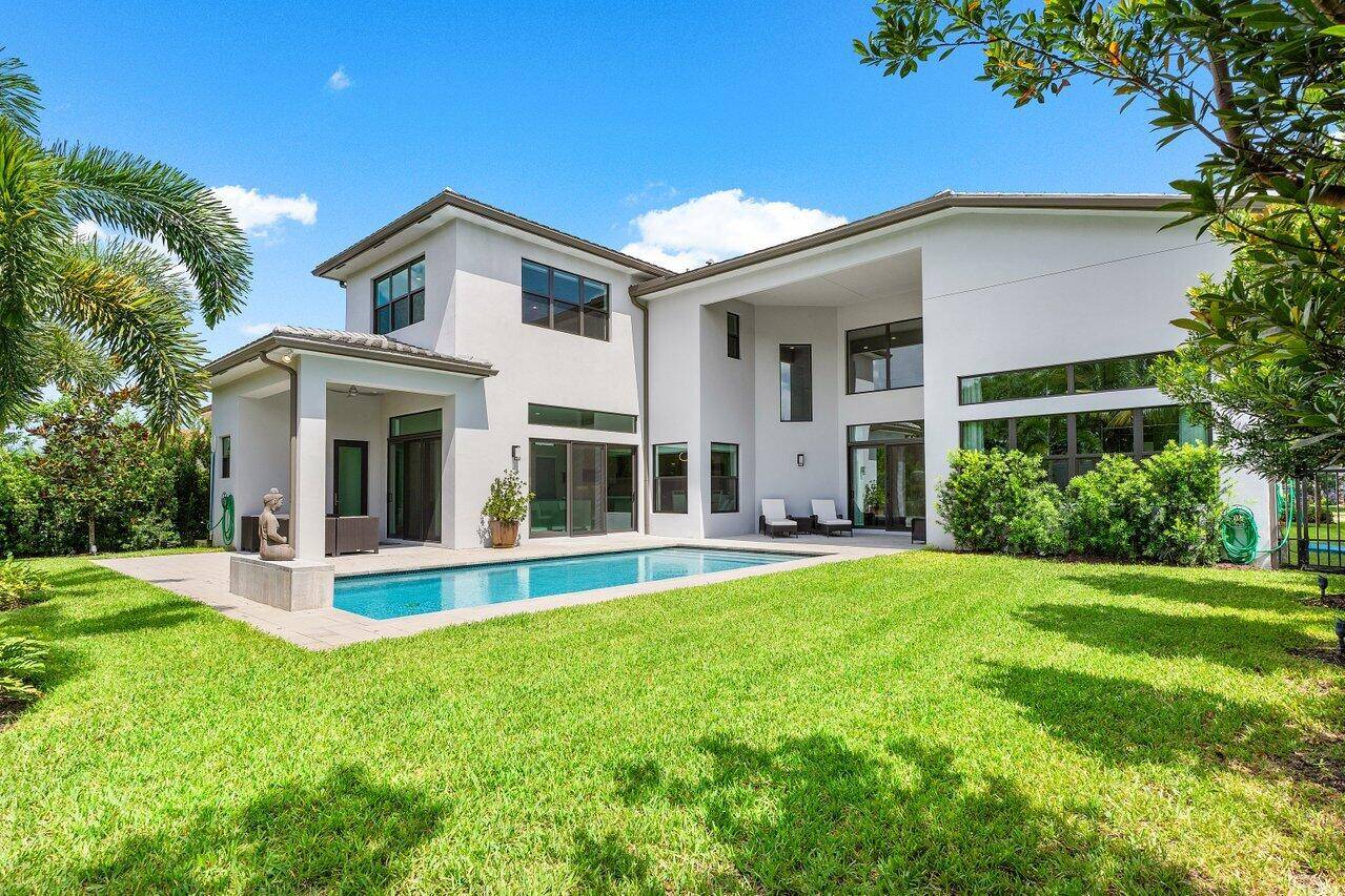 This contemporary Colonnade Grande set in the prestigious Boca Bridges, includes 5 bedrooms plus a theater or 6th bedroom, 8 bathrooms, and a 3 car garage.
