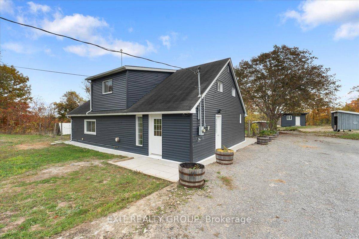 Discover peace, privacy, and charm in this gorgeous 4 bedroom, 2 bath custom built home surrounded by 31.
