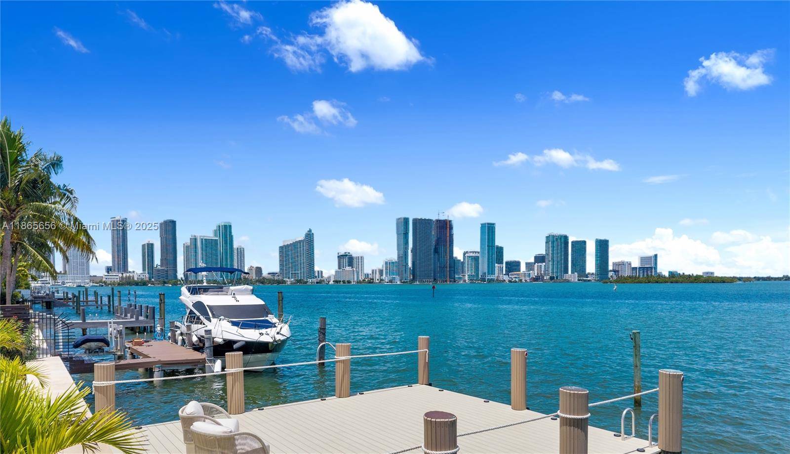 Renovated three bedroom modern waterfront home furnished with luxurious Italian furniture and Miami skyline in your back yard.
