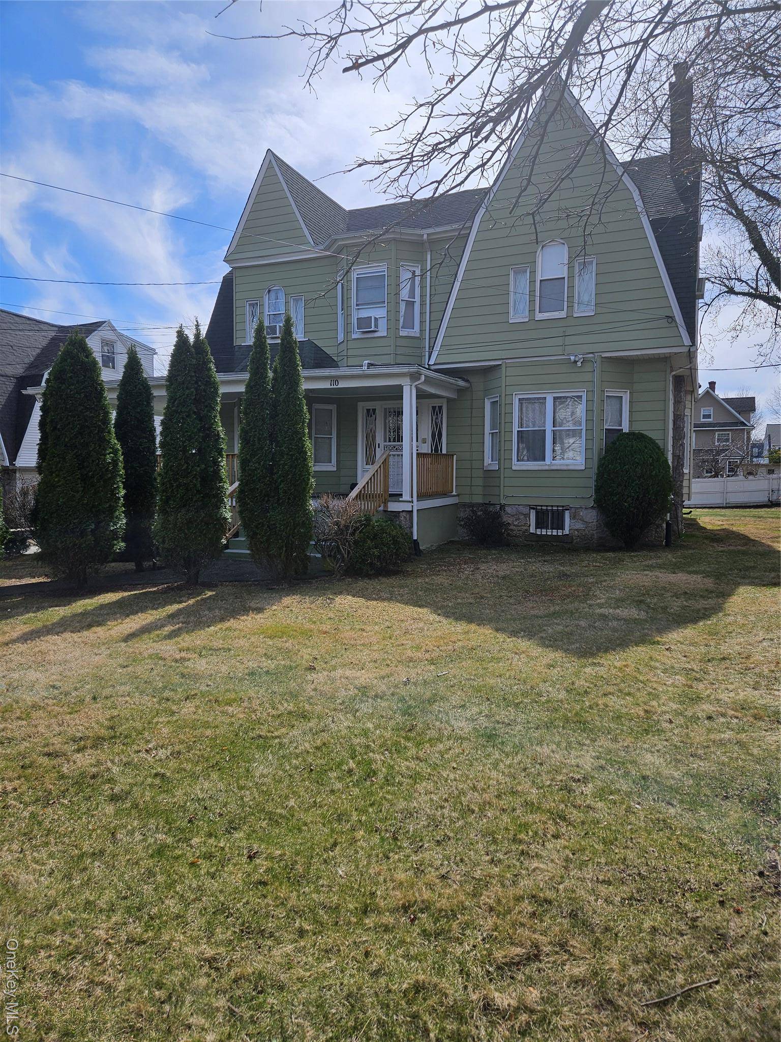 Poised ever so gently on a third of an acre lot sits this Victorian style Duplex in the suburbs of New Rochelle.