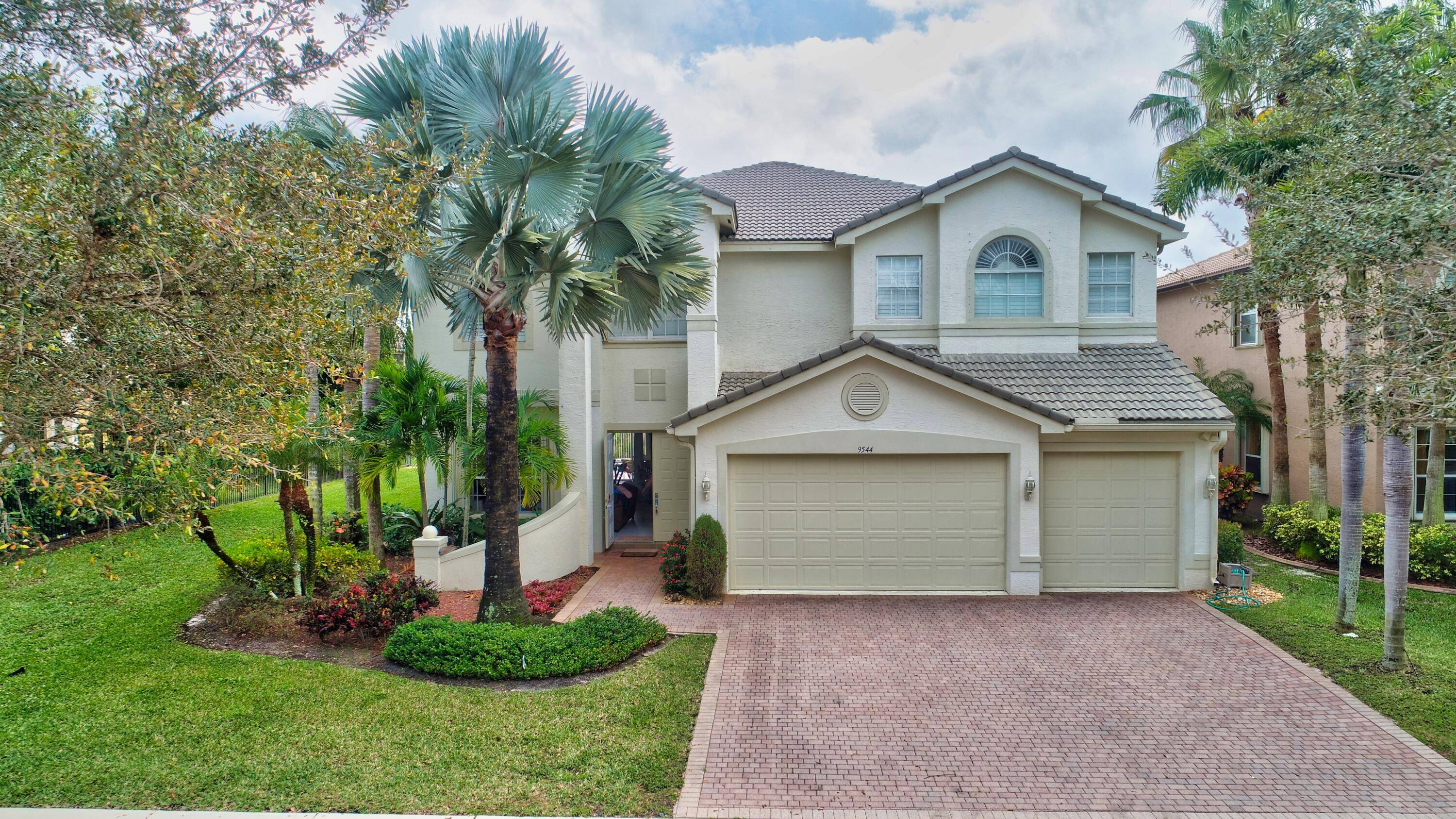 Beautifully renovated 5BR 4BA pool home in the gated community of Saturnia Isles in west Delray.