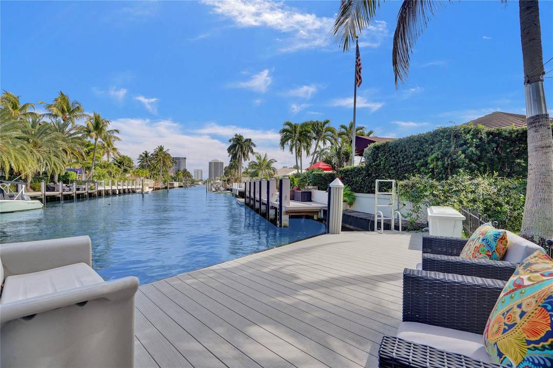 Beautifully renovated deep water residence situated on an oversized corner lot offering ultimate privacy with a park like atmosphere.