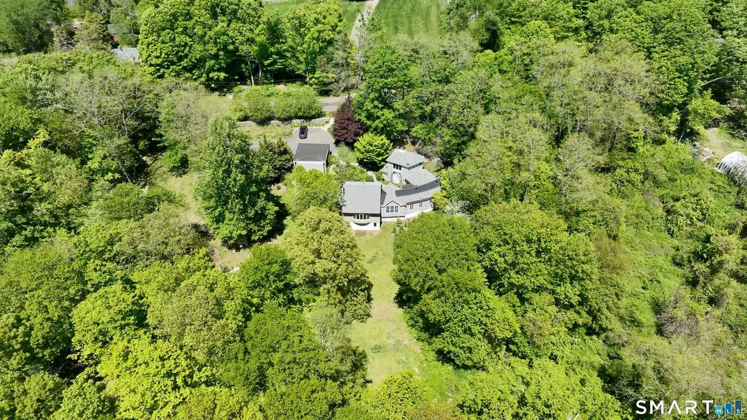 Set on a scenic rise known as Taylor Hill, this architect designed home offers a rare blend of history, privacy, and natural beauty.