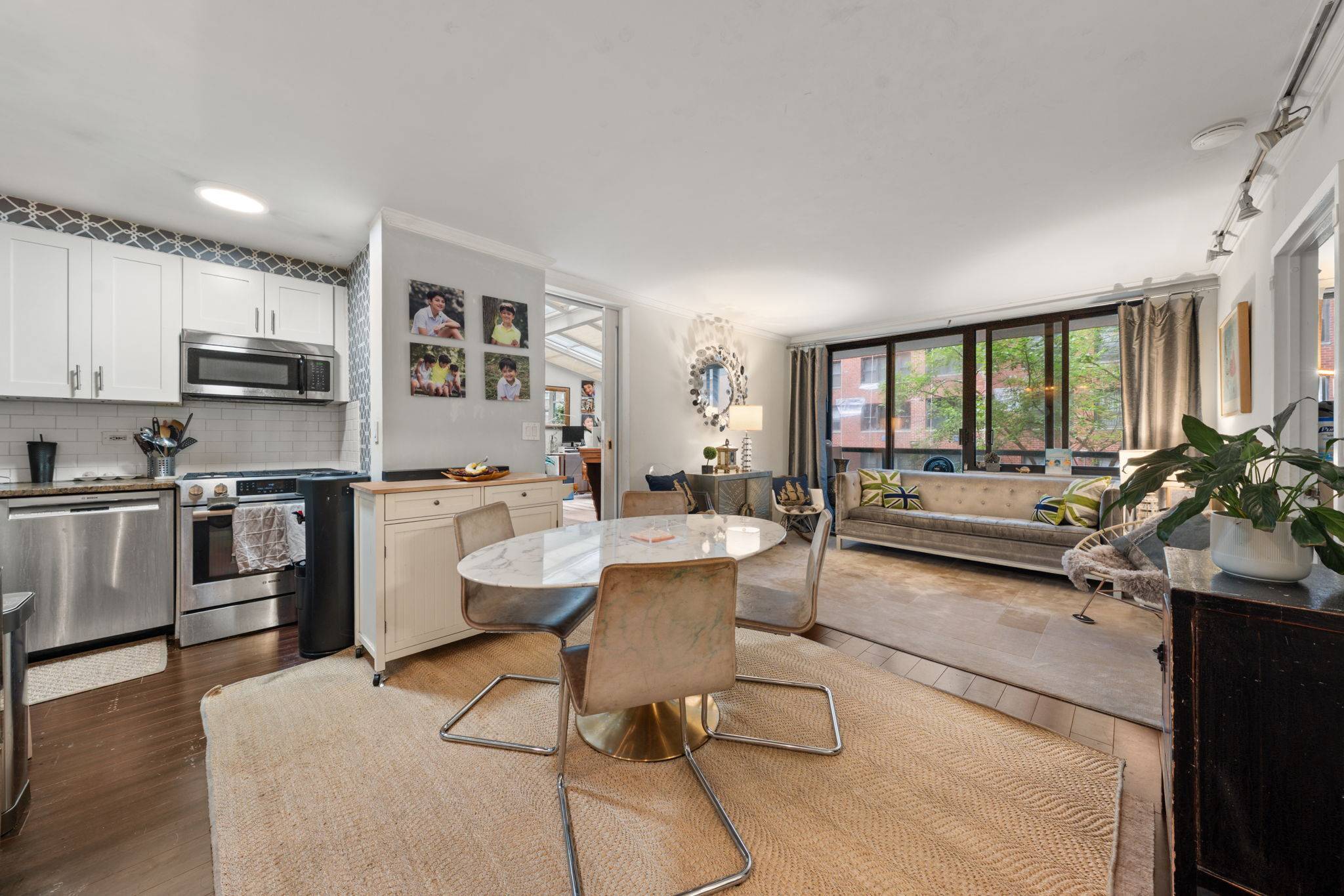 Welcome to this pin drop quiet 2 bed 1 bath condo at The Carriage House featuring a separate home office, a flexible loft area and a unique sunroom bedroom topped ...
