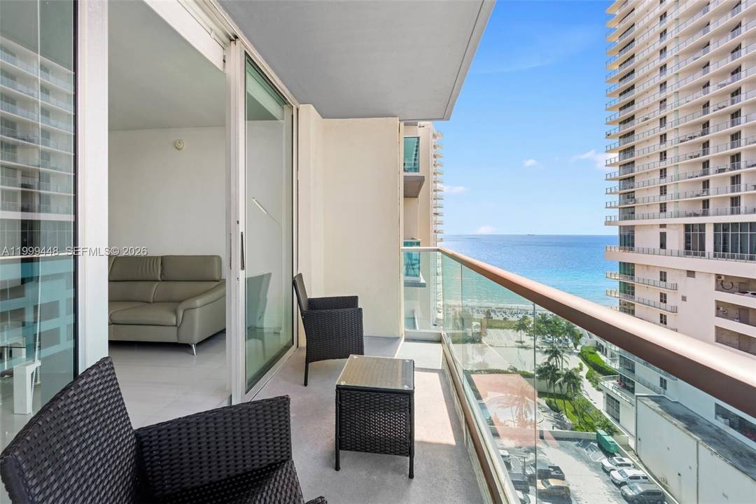 Wake up to sweeping ocean views from this spacious 2 bedroom, 2 bath corner residence in Sian Ocean Residences.