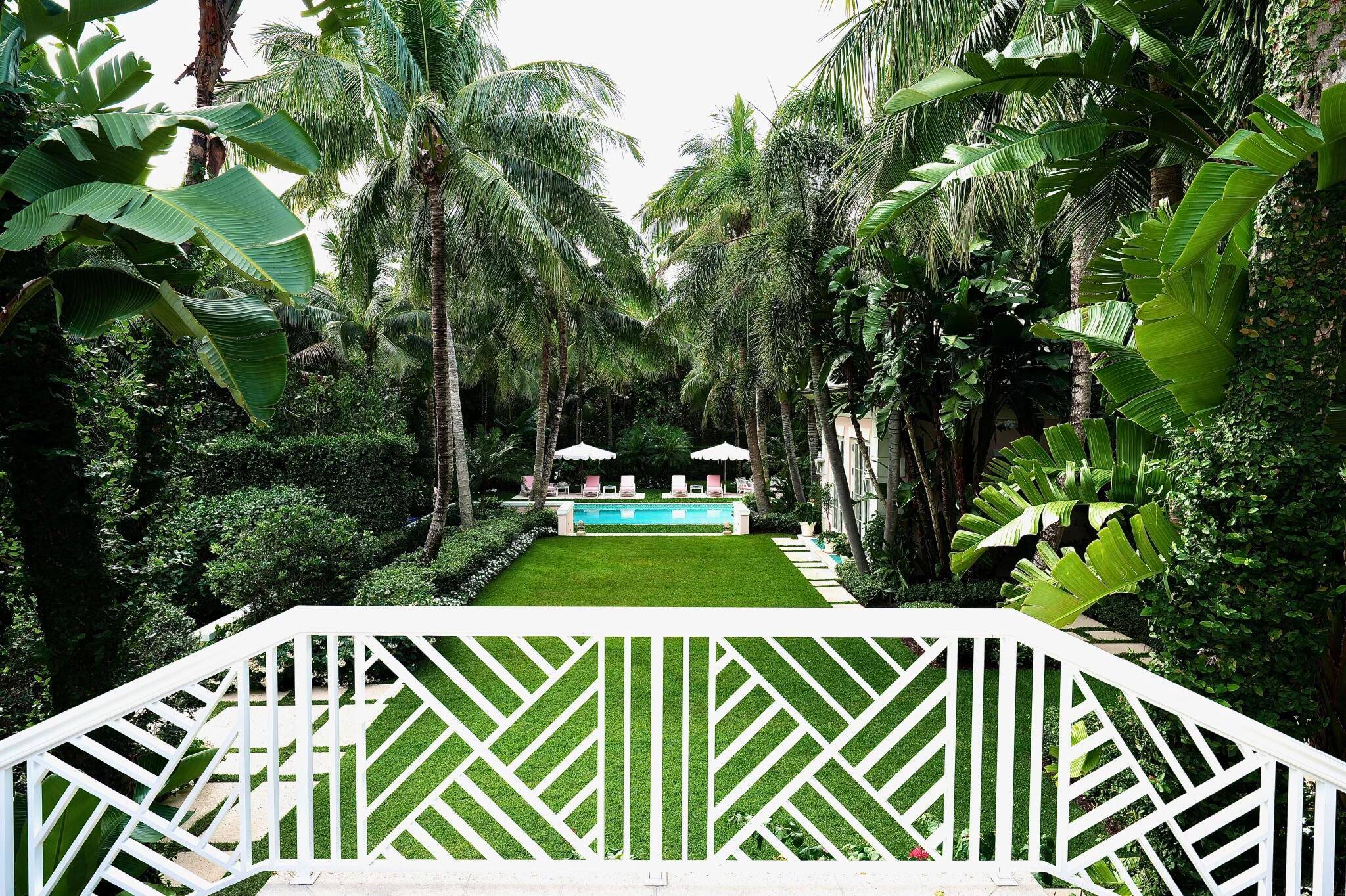 Sitting on 2 acres, 338 S Beach Rd on Jupiter Island is the epitome of old world Florida sophistication and tasteful elegance.