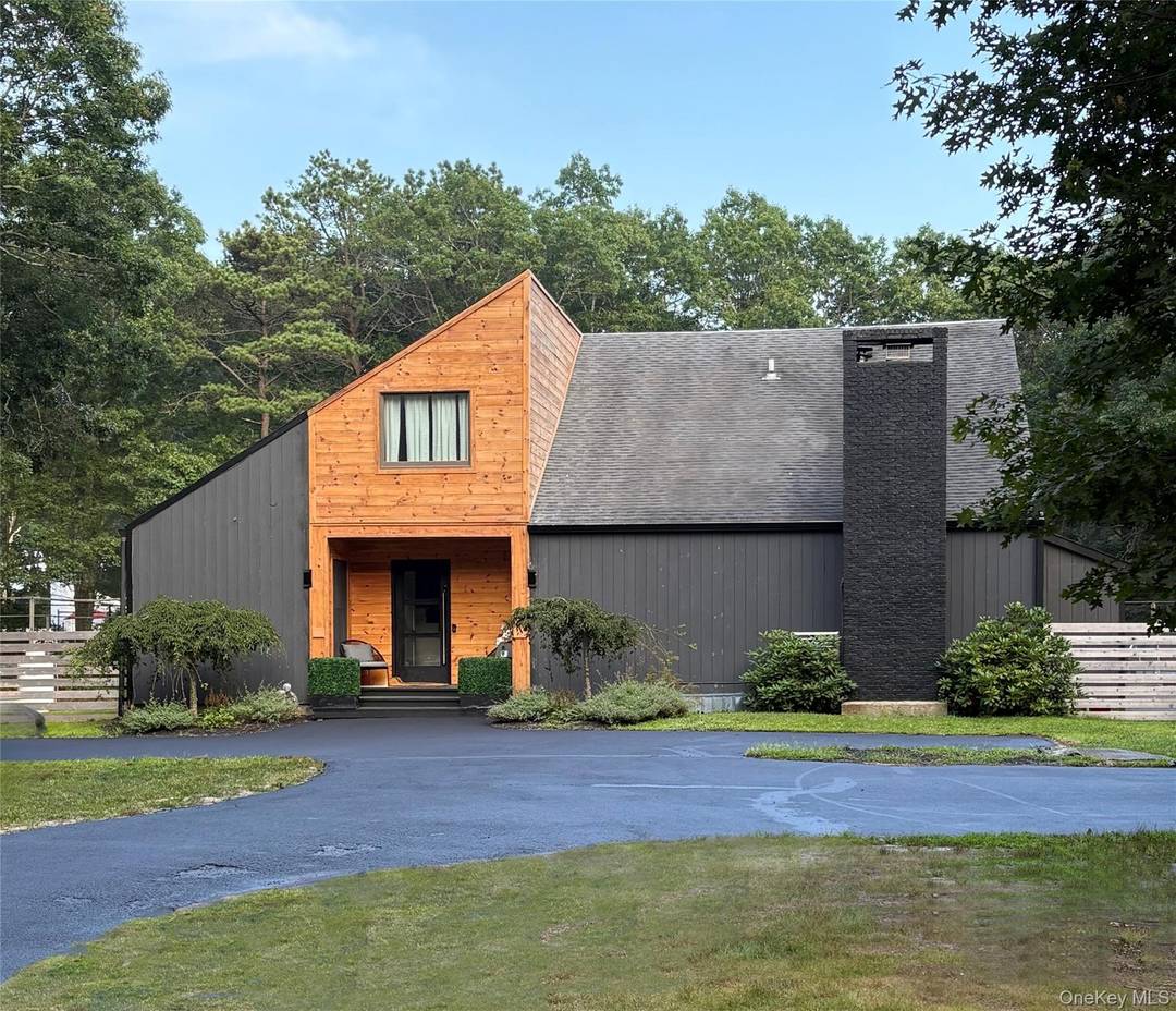 This exceptional Hamptons home offers five bedrooms, three bathrooms, and many luxurious amenities.