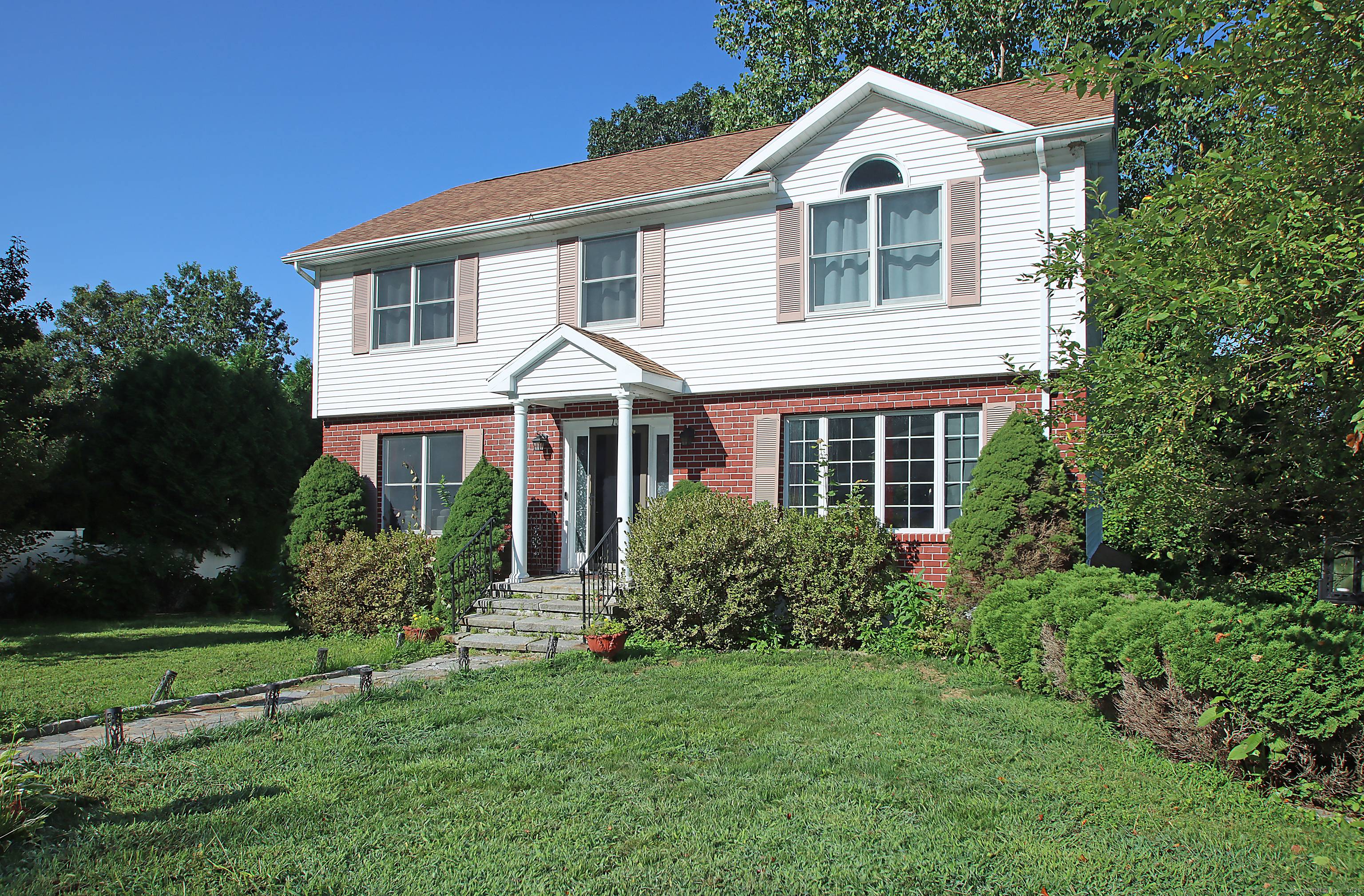 Nestled in a peaceful Naugatuck neighborhood, this classy Colonial offers 3 beds 3.