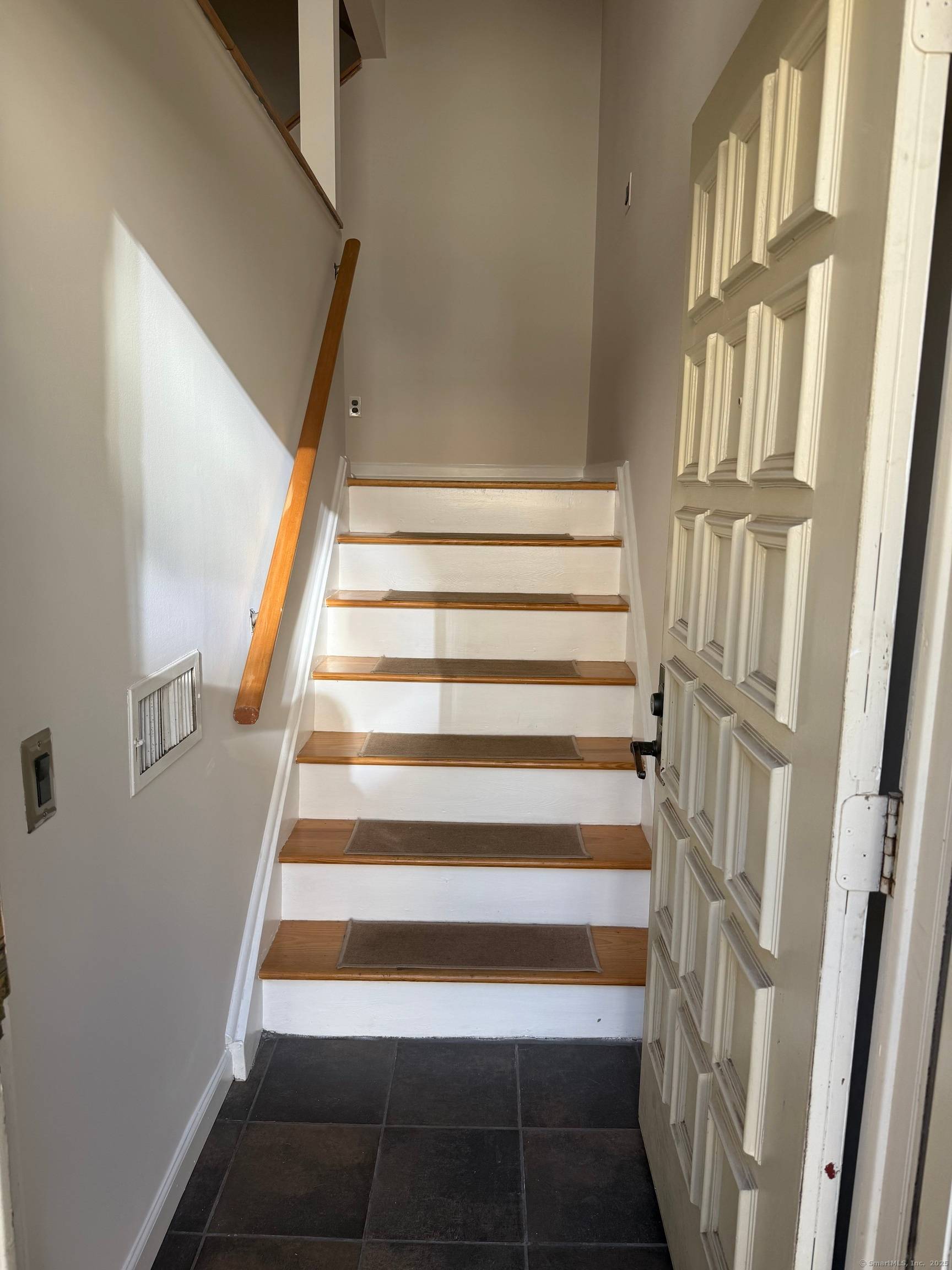 Discover the perfect balance of comfort and convenience in this 2 bedroom, 2 bath, 3 level townhouse in Norwalk's sought after Sunrise Hill community.