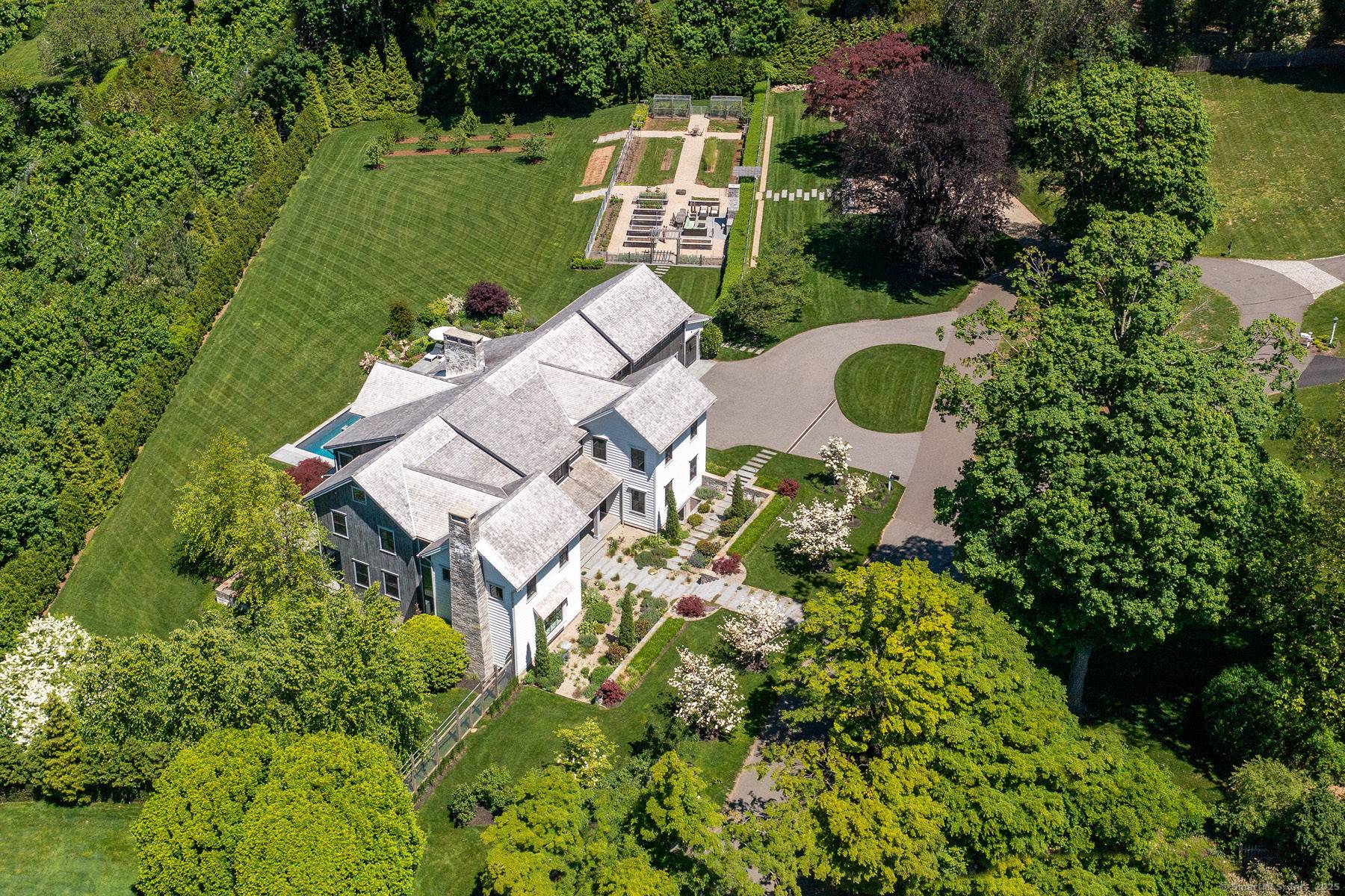 Welcome to your dream home on Westport's premier Compo Beach cul de sac an extraordinary 2 acre estate offering privacy, luxury, and resort style living in one of Fairfield County's ...