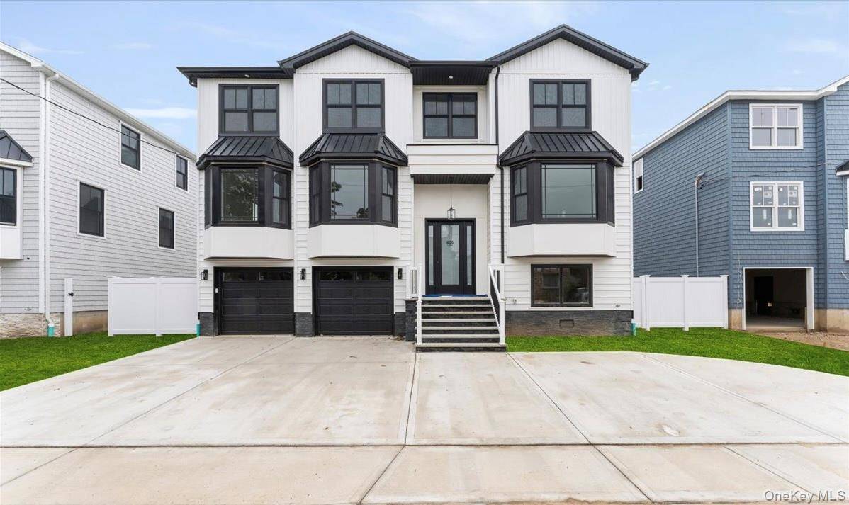 Welcome to 905 Greenfield Rd, a stunning new construction in the prestigious Academy Area of Woodmere.