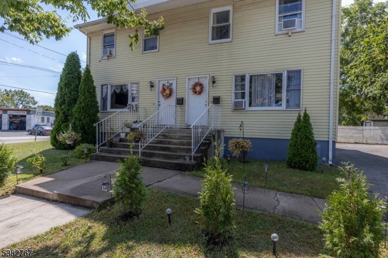 Welcome to this rare side by side two family home in Rahway !
