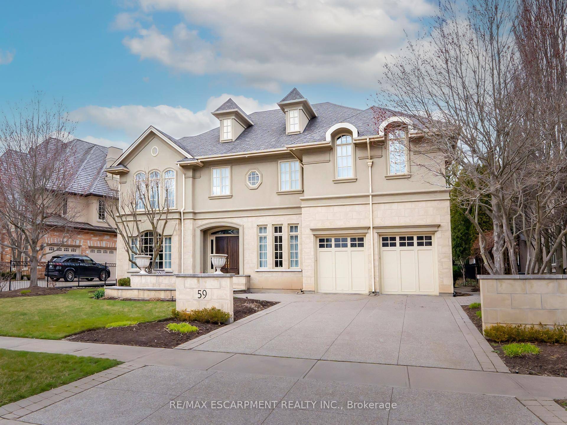 Welcome to 59 Bel Air Drive in Morrison, one of Oakville's finest neighborhoods.