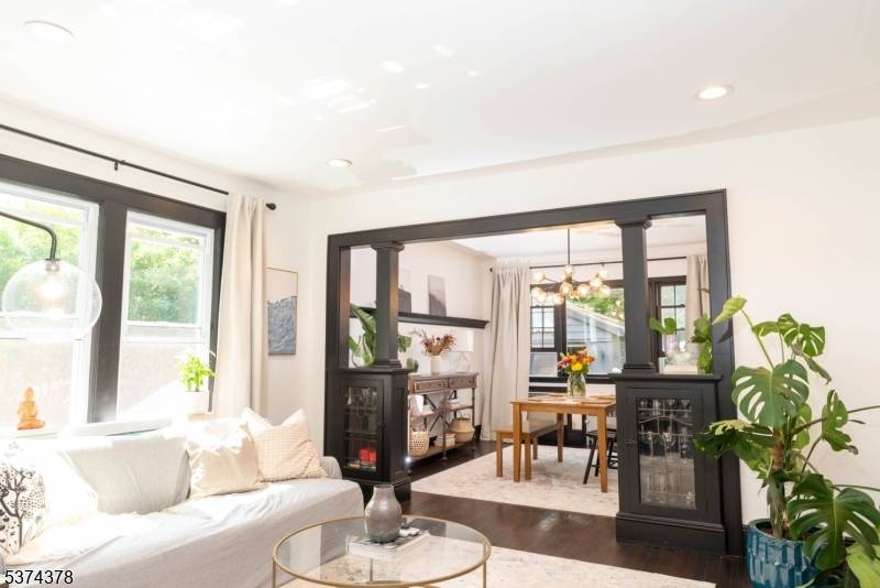 Step into timeless charm and modern comfort with this beautifully updated side hall colonial.