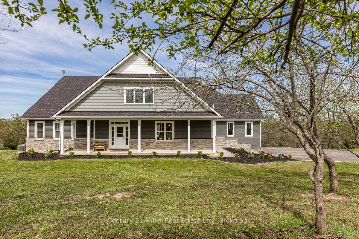 Welcome to 5583 Third Line a stunning custom built country estate where craftsmanship, modern luxury, and efficiency meet.