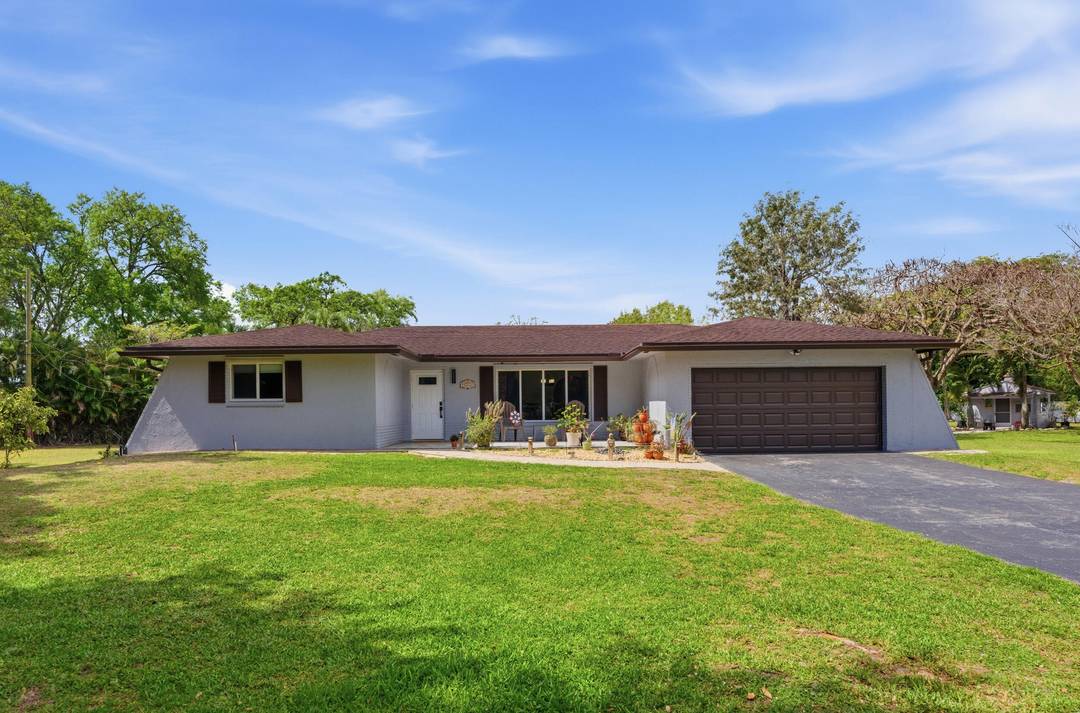 This rare 3 bed 2 bath gem sits on a full acre in a highly desirable area offering privacy and endless potential.