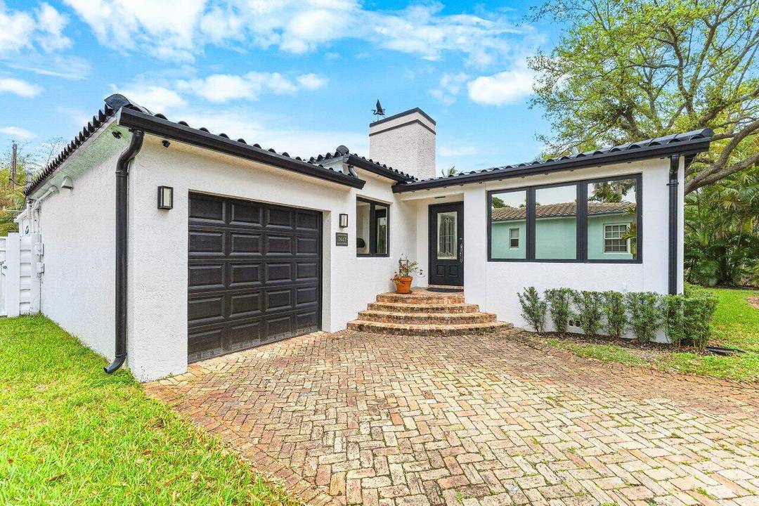 Step into refined living in this impeccably upgraded two bedroom, two bath home with a versatile den, easily convertible to a third bedroom.