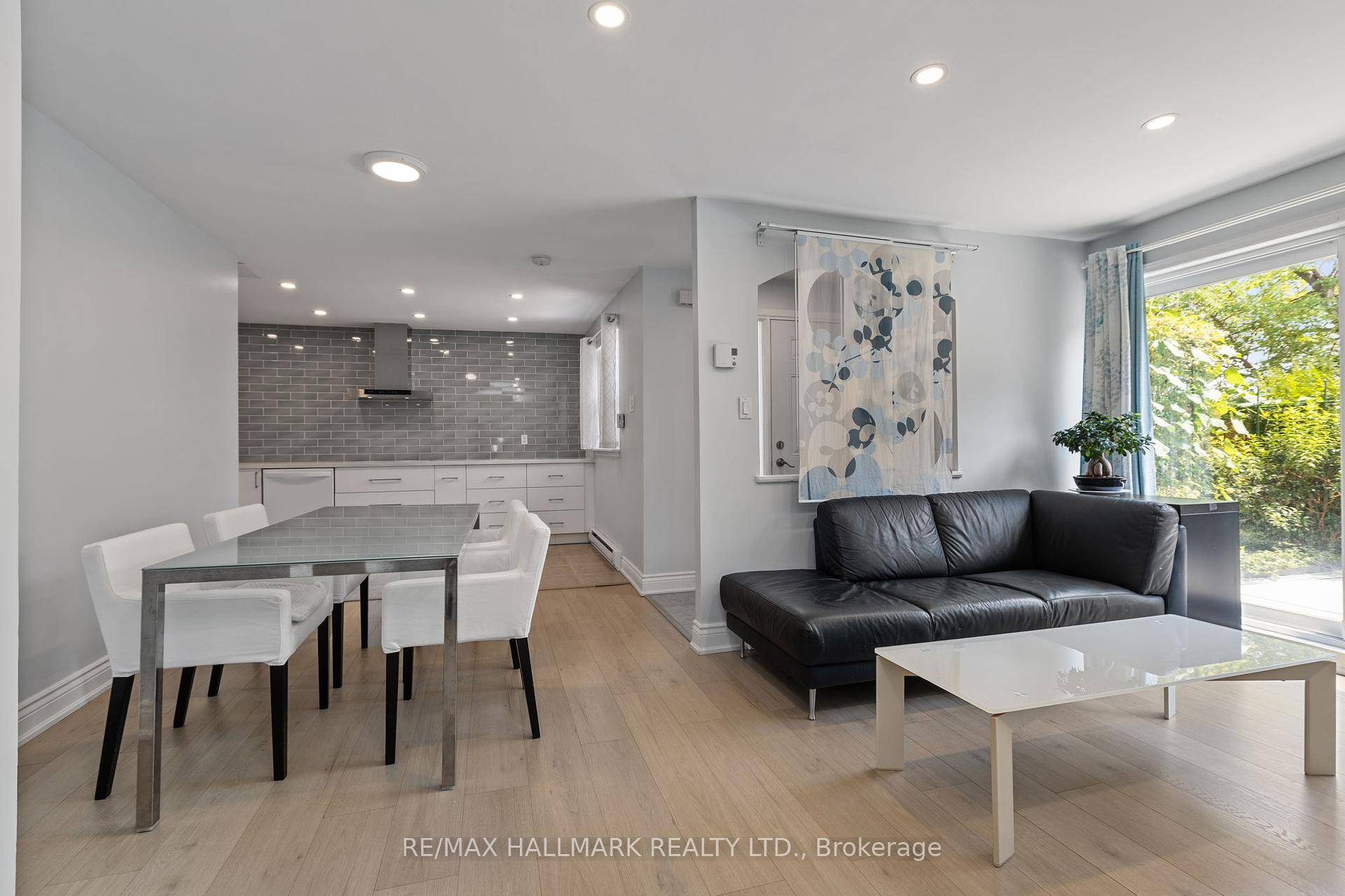 Welcome to this beautifully cared for 2 Storey stacked townhome fts a PRIVATE, SOUTH FACING GARDEN OASIS !
