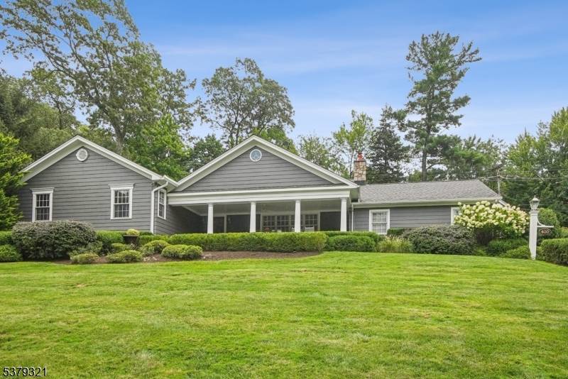 Nestled in a lush setting, discover refined living in this extraordinary high end Ranch, masterfully designed for those who appreciate the finer things in life.