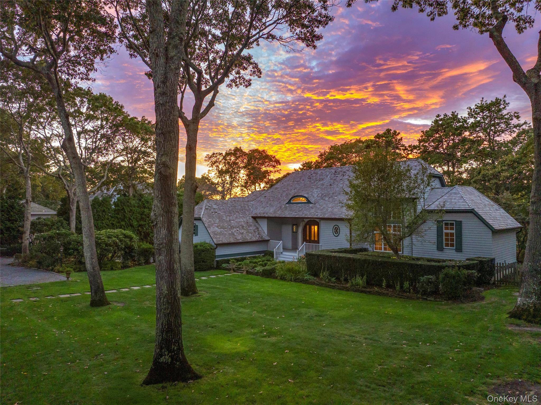 Welcome to 8 Fish Creek Lane, a remarkable waterfront property nestled in the serene and picturesque Hamlet of Remsenburg, NY.