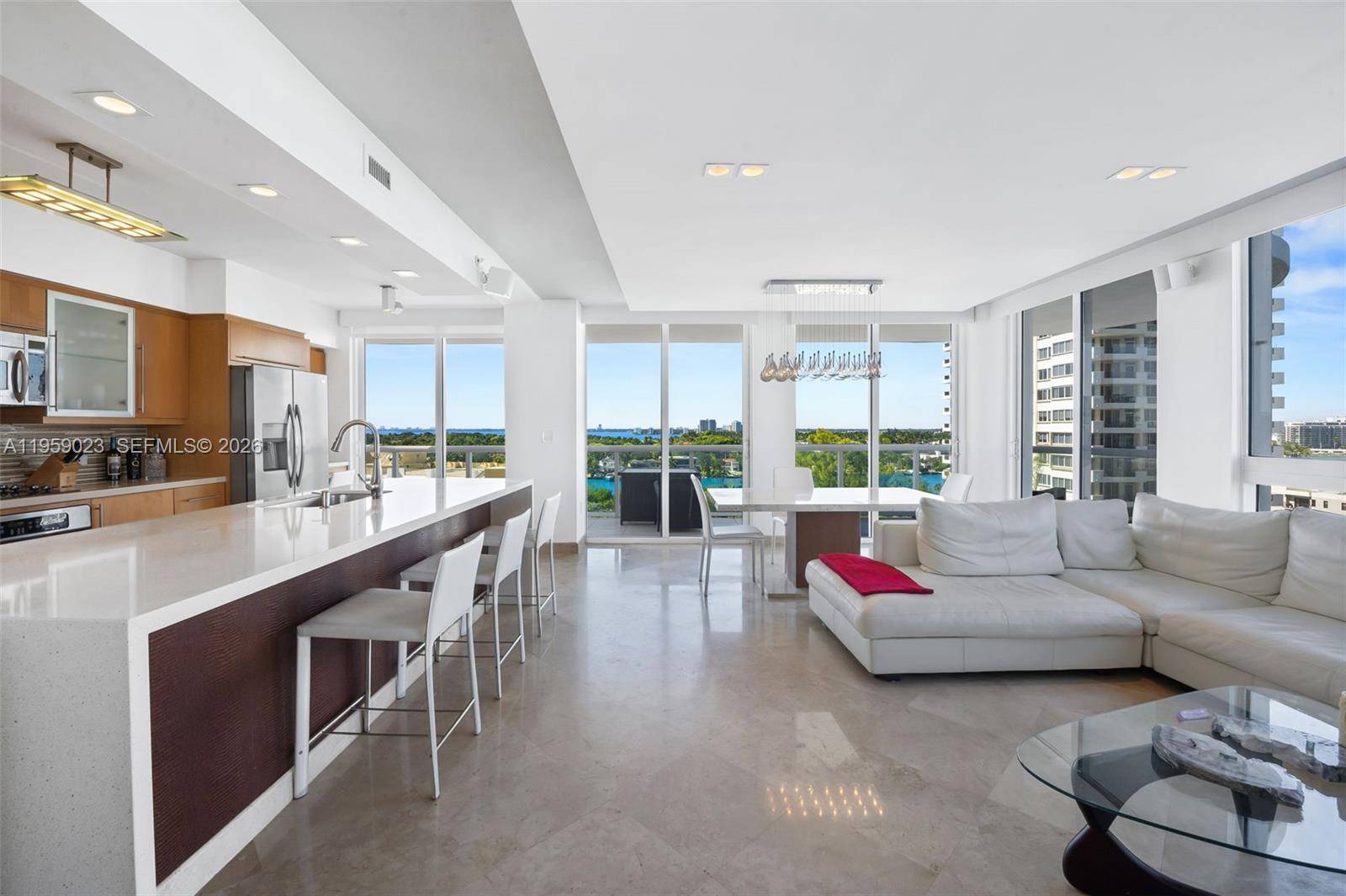 Indulge in elevated oceanfront living at a sophisticated coastal residence perfectly positioned along the iconic shores of Miami Beach.