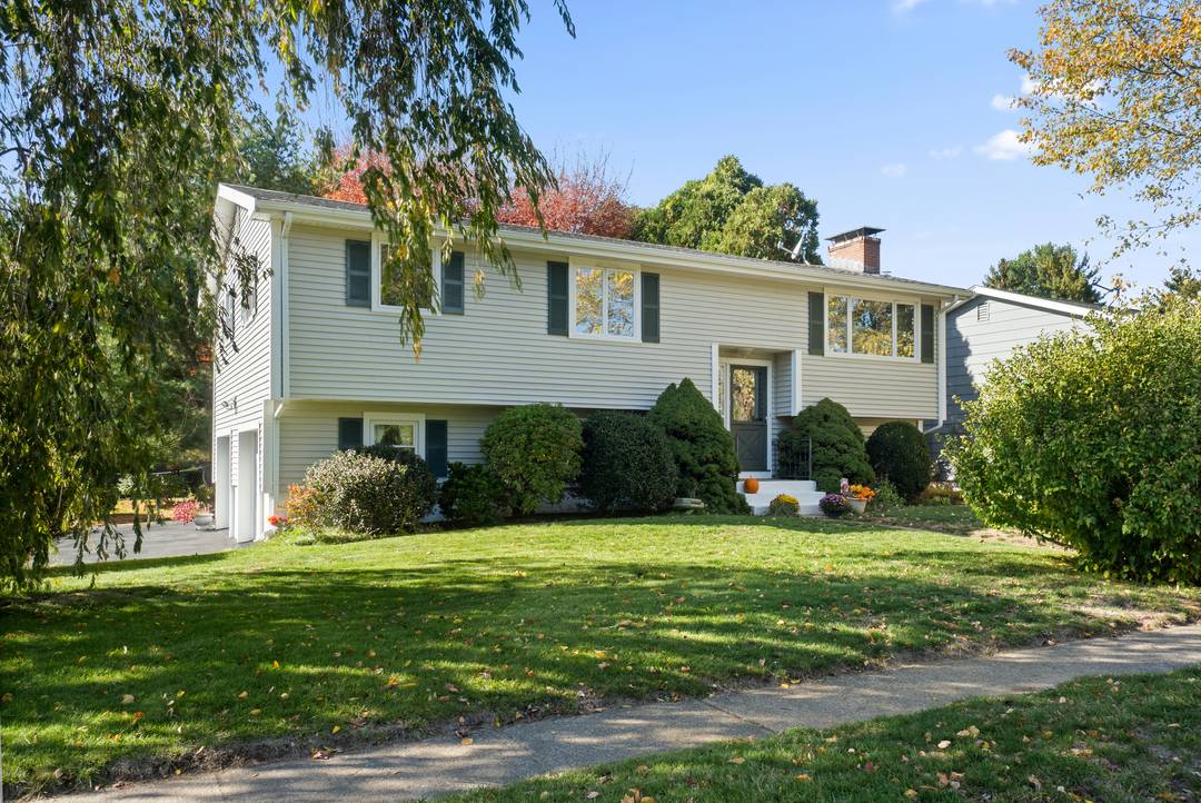 Welcome to 255 Capstan Ave, a well maintained 2 bedroom, 2 bathroom home perfectly situated on a large, private corner lot in one of West Mystic's most peaceful neighborhoods.