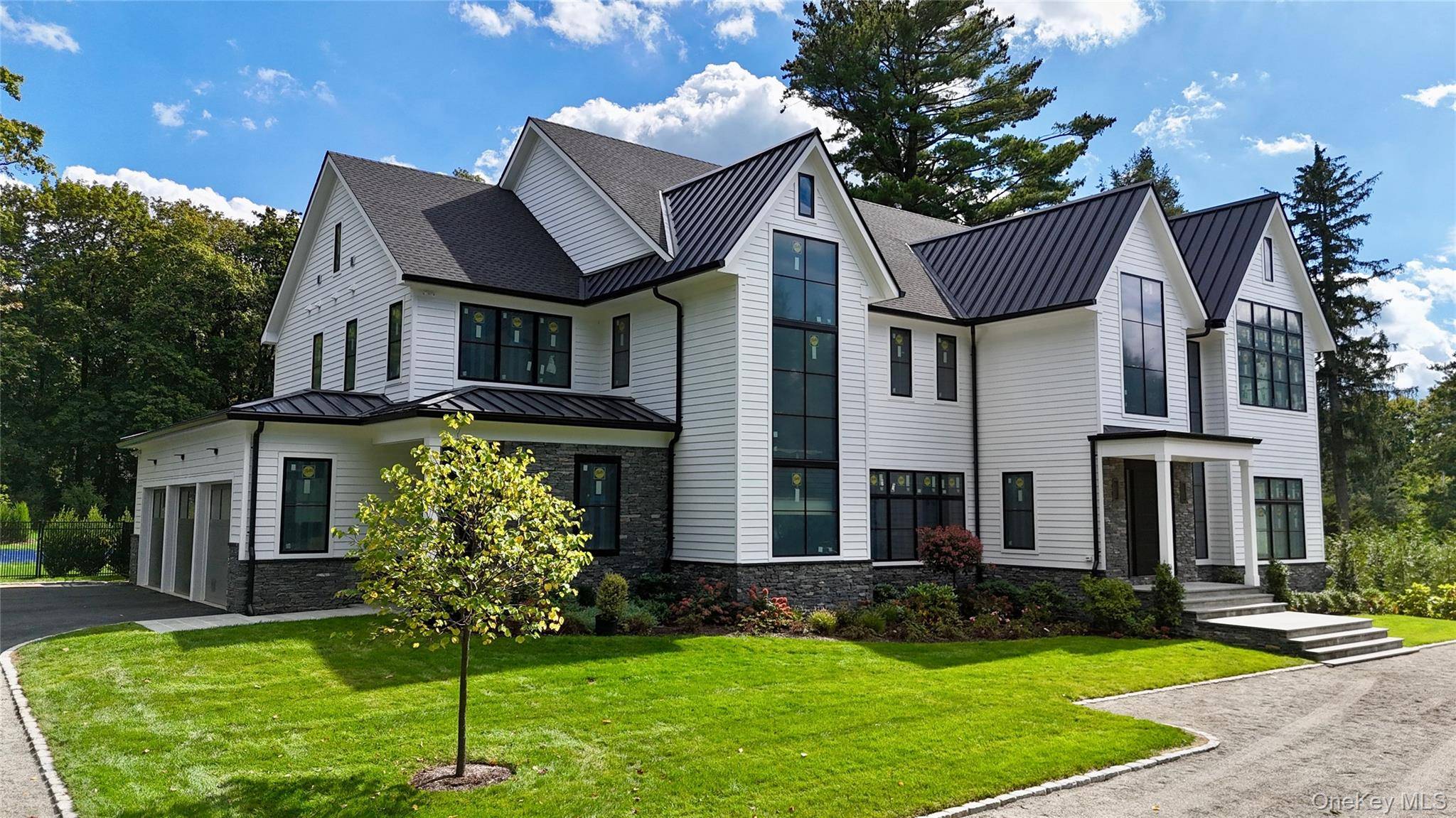 Stunning new construction by award winning custom luxury home builder, KOSL Building.