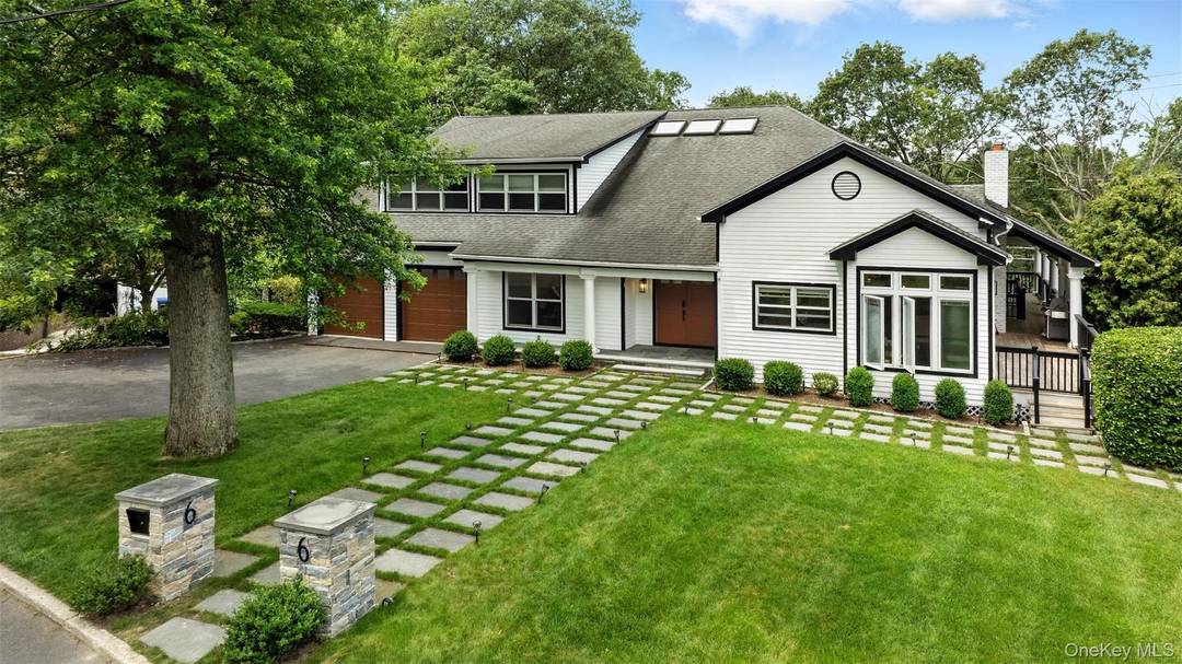 This stunning contemporary home, located in the award winning Edgemont School District, offers nearly half an acre of professionally landscaped grounds with an in ground pool.