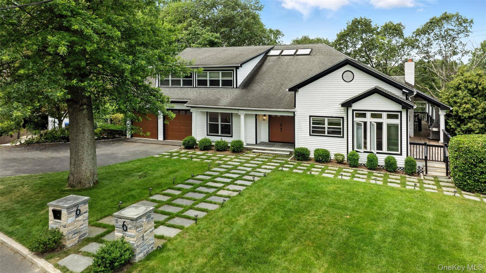 This stunning contemporary home, located in the award winning Edgemont School District, offers nearly half an acre of professionally landscaped grounds with an in ground pool.